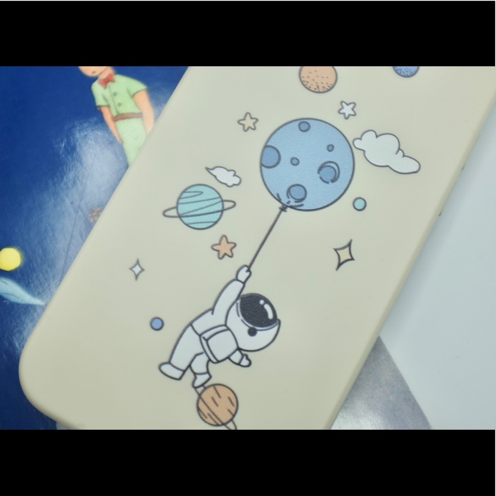 Cute spaceman iPhone 12 case in vanilla colour